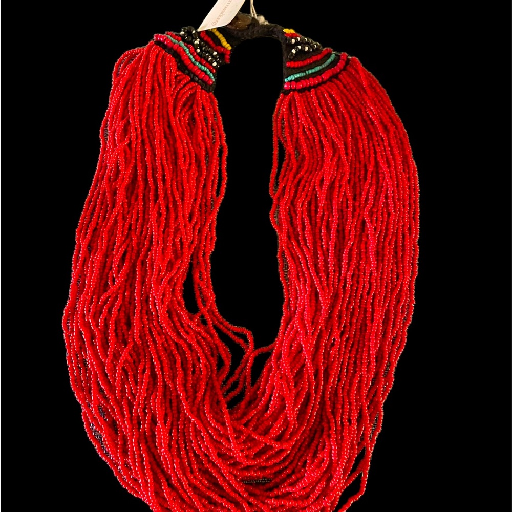 Beaded Necklace between 18- 20 inches long button closure